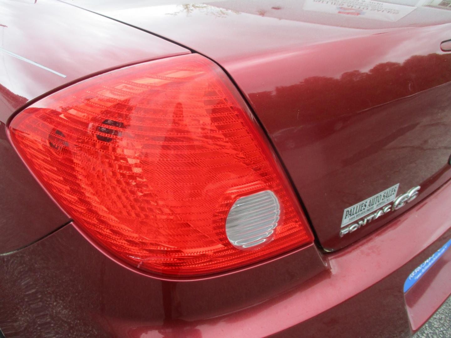 2009 RED Pontiac G6 Sedan (1G2ZJ57B994) with an 2.4L L4 DOHC 16V engine, 4-Speed Automatic transmission, located at 540a Delsea Drive, Sewell, NJ, 08080, (856) 589-6888, 39.752560, -75.111206 - Photo#4